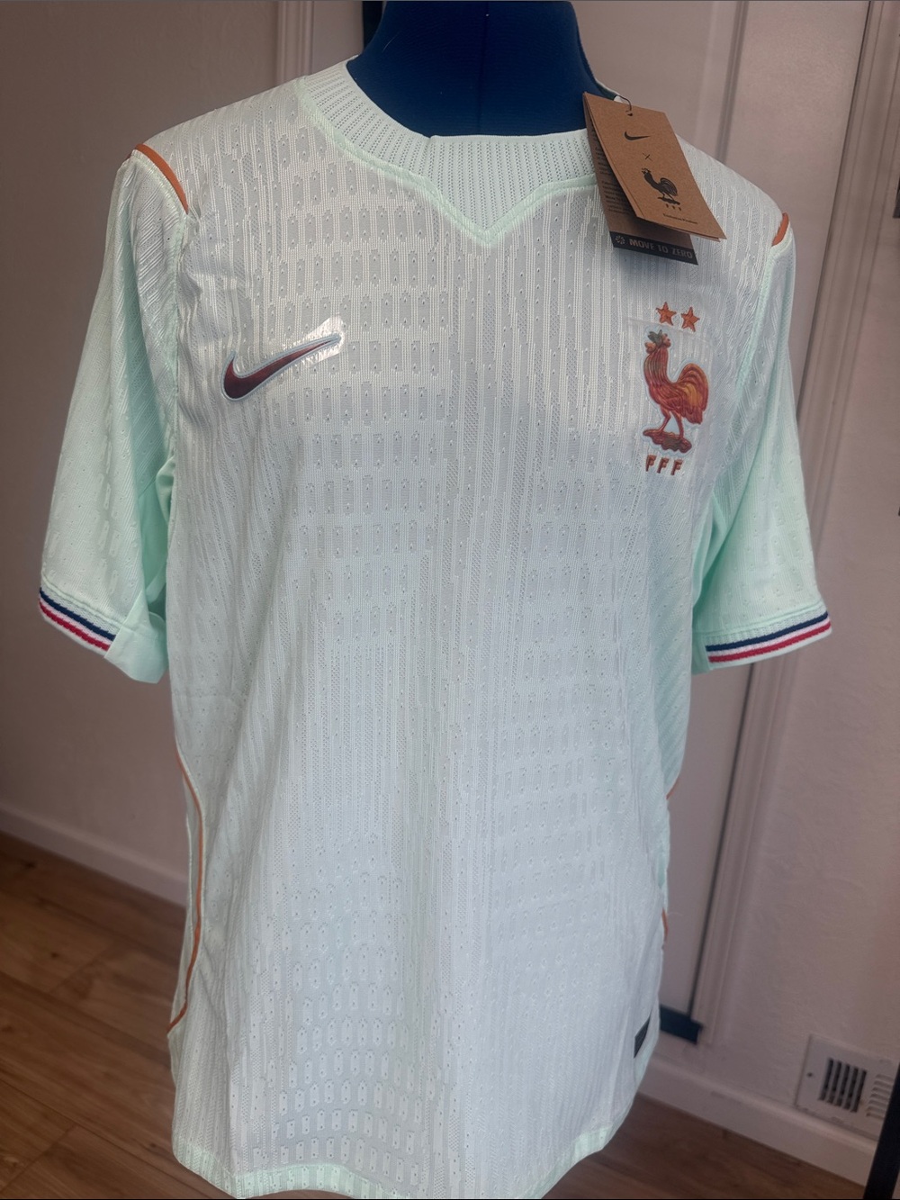 Nike Men’s Igloo Mint Green France Football Jersey with Orange Accents size M